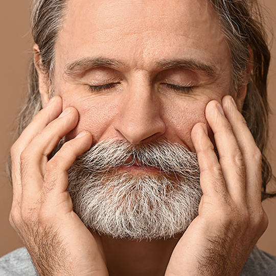 Man with visible dry skin and wrinkles